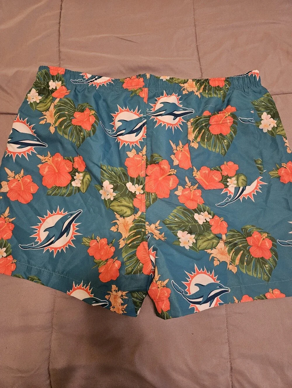 NFL Men’s Dolphins Teal Swim Trunks with Coral Floral Print